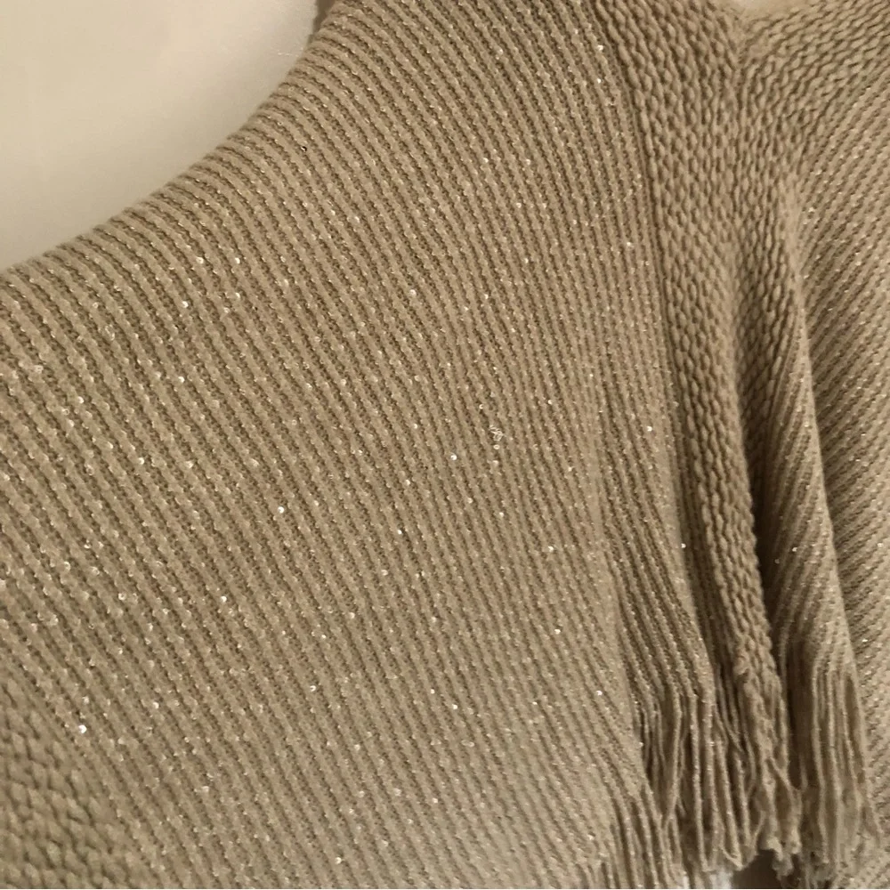 Tan knitted metallic gold fringe hem poncho